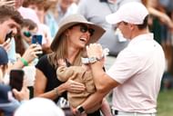 The McIlroys (Image via Getty).
